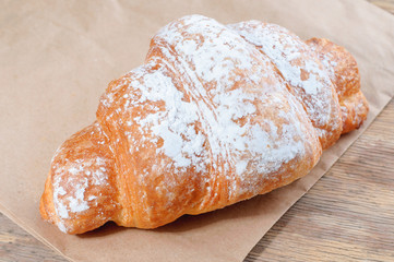 Fresh Croissant with powdered sugar