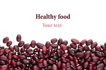 Border of red  kidney beans closeup with copy space on white background. Isolated. Healthy protein food.