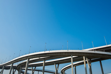 The devious Bhumibol Bridge with blue sky in Bangkok, Thailand.