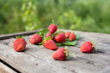 Fresh strawberries on wooden table