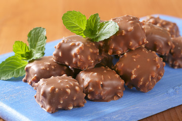 Chocolate-covered marzipan squares