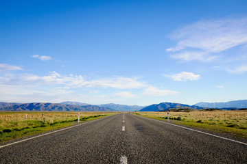 Highway 8, the road between Lake Tekapo and Lake Pukaki in the South Island, during spring season of New Zealand.