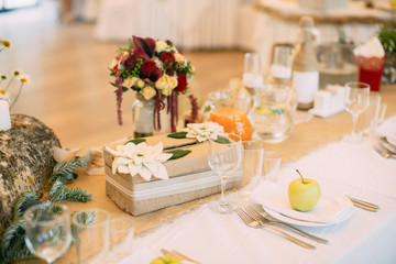 Beautiful wedding table with wedding decor. Birch. In bossage style