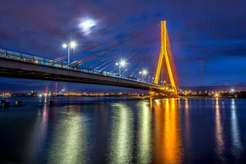 Fototapeta na wymiar Cable stayed bridge over Martwa Wisla river at night in Gdansk. Poland Europe.
