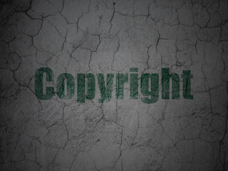 Law concept: Copyright on grunge wall background