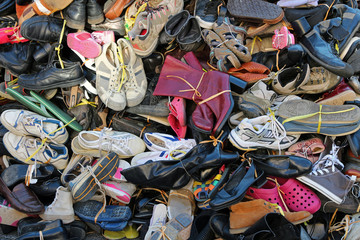 used shoes collection for charity - obrazy, fototapety, plakaty