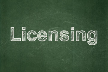 Obraz premium Law concept: Licensing on chalkboard background