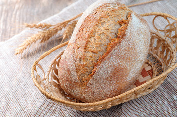 closeup view on loaf of bread on vintage background