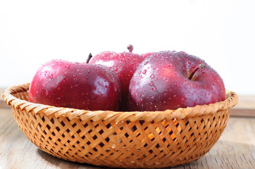 red apples in basket
