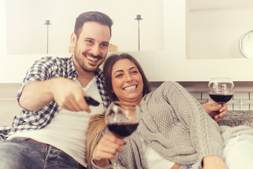 Happy couple having fun together at home