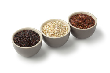 Bowls with red, white and black quinoa