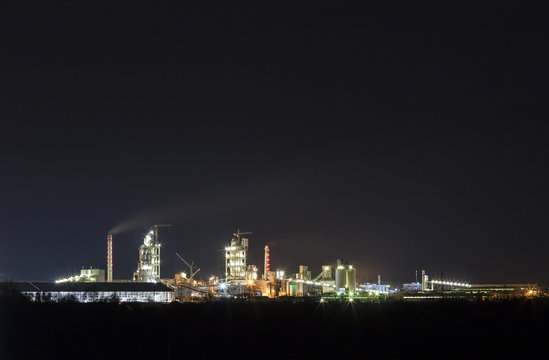 Panorama view of cement plant and power sation at night in Ivano © bilanol