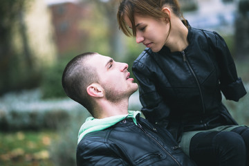 Romantic relationship between invalid young woman born without arms and her boyfriend. 