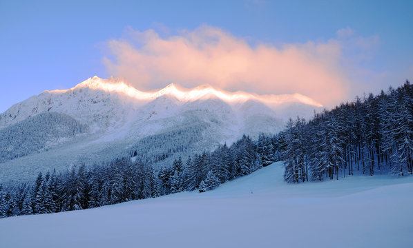 Sunrise over Snow-covered Mountains of the Marienberg-Biberview Alps (View from Obsteig in Tirol, Austria)  in Winter