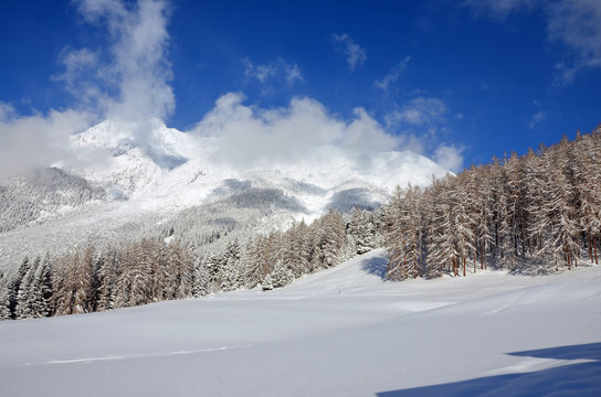 Snow-covered Mountains of the Marienberg (Biberwier), View from Obsteig in Tirol, Austria)  in Winter