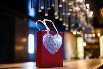 Valentine's day background with shopping bag and heart shape