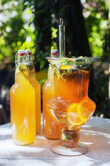 A delicious lemonade with citrus and mint. The concept of food 