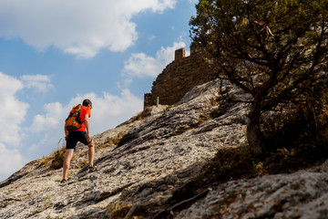 Man on mountain in summer