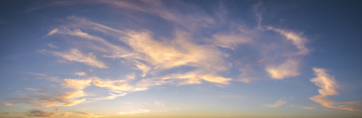 Naklejka na ściany i meble beautiful evening sky over at sunset
