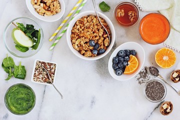 Breakfast set with granola, fresh Juice and various of topping. Healthy eating and super foods concept. 