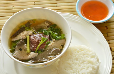 boiled pork blood and entrails soup eat couple with rice on dish