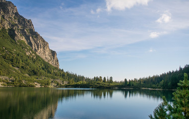 Naklejka na ściany i meble Mountain lake surrounded by high mountains. High Tatras, Slovakia