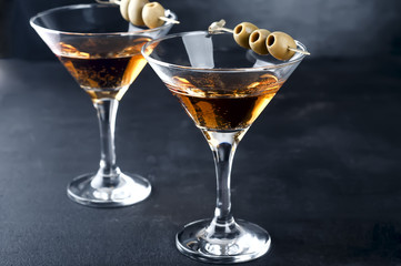 Martini glass and olives