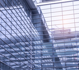 Fototapeta premium Contemporary office building blue glass wall detail