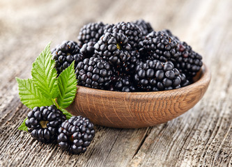 Blackberry on a wooden background