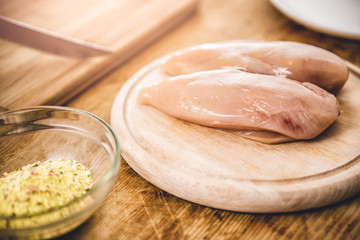 Chicken breasts on cutting board