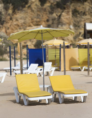 chairs and umbrellas and beach