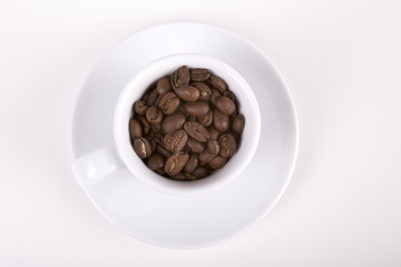 cup of coffe with beans on white background