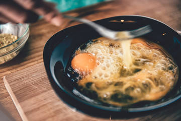 Woman mixing eggs