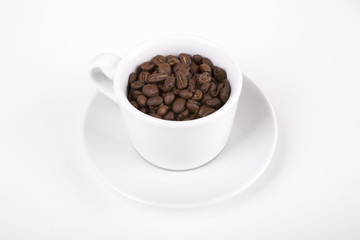 cup of coffe with beans on white background