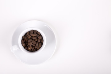 cup of coffe with beans on white background