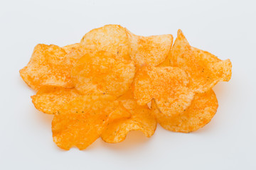 Crisps with paprica on a white background.