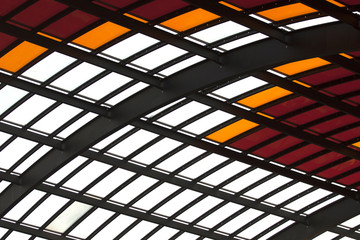 Metal roof with  colored  glass in red white and orangeMetal roof 