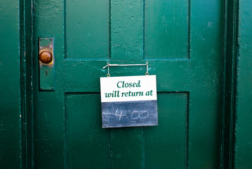 Closed sign on a door