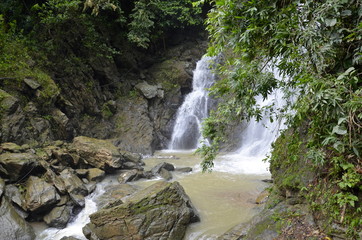 Fototapeta premium Waterfall in deep forest on the mountain.