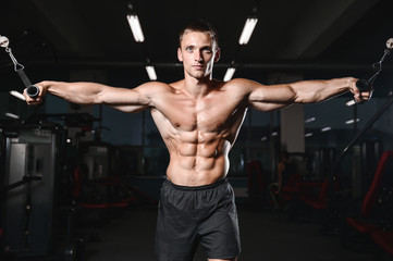 Obraz na płótnie Canvas young man train in gym healthcare lifestyle sexy caucasian man.