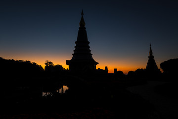 Obraz premium Beautiful Temple silhouette in Thailand, Pagoda on Inthanon national park at Chiang mai, Thailand.