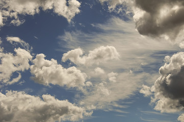 Naklejka na ściany i meble Cumulus and Cirrus clouds
