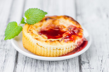 Cheesecake with berry Sacue (selective focus)