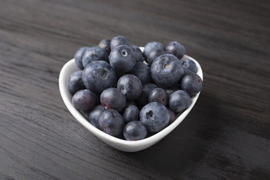 delicious blueberries in white bowl