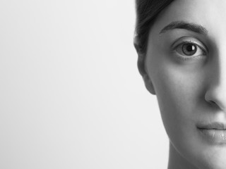 Fototapeta premium Black And White Half Portrait Of Young Beautiful Girl