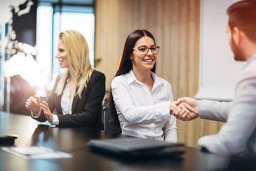 Business people agreement during board meeting