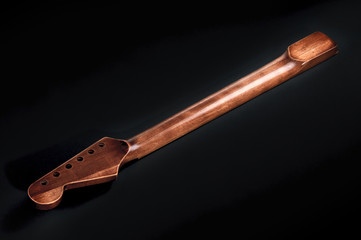 Guitar neck, fretted rosewood. Electric guitar making. Guitar 