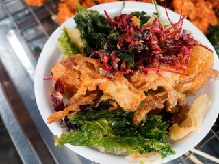 Vegetable fritters for sale in a market, Thai food.