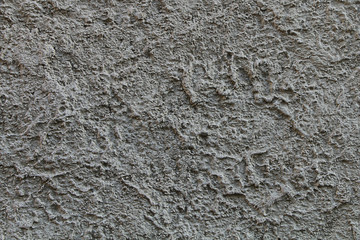 Texture of gray wall with an unusual finish.