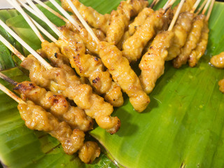 pork satay(moo satay) on banana leaf plate